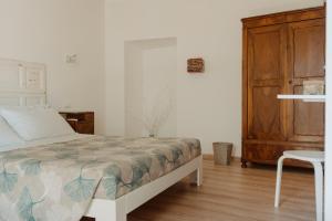 Postel nebo postele na pokoji v ubytování La Torre Vasto B&B