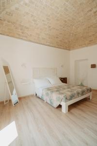 Postel nebo postele na pokoji v ubytování La Torre Vasto B&B