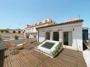 a deck with a swimming pool on top of a house at Terrazzini Cibele in Andria