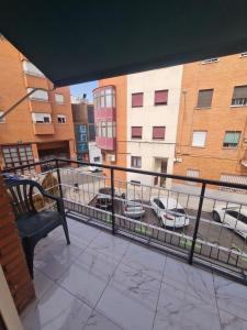 a balcony with a view of a parking lot at Piso en el centro de Madrid in Madrid