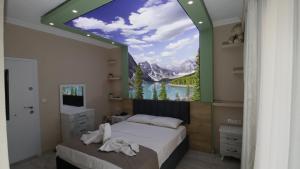 Ένα ή περισσότερα κρεβάτια σε δωμάτιο στο Seydikemer Yıldız hotel