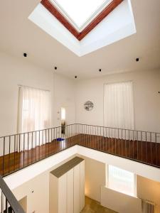 a large room with a skylight in the ceiling at Terrazzini Cibele in Andria