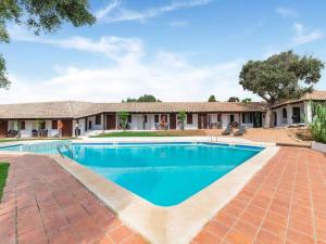 an image of a swimming pool in front of a house at Authentic apartment in Binibeca Vell with private terrace in Binibeca