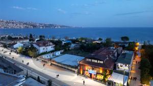 an overhead view of a town with the ocean at Turkuaz Boutique Hotel in Buyukcekmece