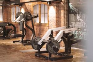 a row of exercise bikes in a gym at Balinese Cityflat AC in Antwerp