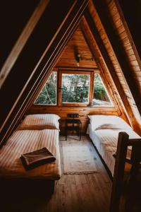 Säng eller sängar i ett rum på Mesa Summer House