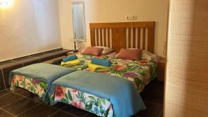 a hotel room with two beds in a room at VILLA SOLANA EN MORAIRA a in Moraira +18 photos