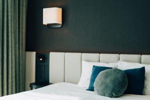 Postel nebo postele na pokoji v ubytování Factory Hotel