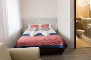 Posteľ alebo postele v izbe v ubytovaní Villa Andalucia SPA & Leisure