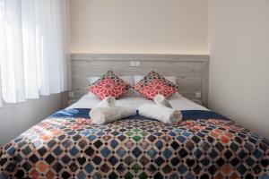 Posteľ alebo postele v izbe v ubytovaní Villa Andalucia SPA & Leisure