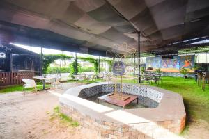 Fotografie z fotogalerie ubytování FabHotel Prime Rajmudra - Nr Butterfly Park - Hinjawadi v destinaci Puné