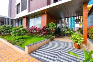 Zahrada ubytování FabHotel Prime Rajmudra - Nr Butterfly Park - Hinjawadi