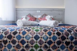 Posteľ alebo postele v izbe v ubytovaní Villa Andalucia SPA & Leisure