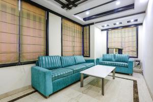 Posezení v ubytování FabHotel Blue Moon Home Stay