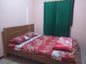 Un ou plusieurs lits dans un hébergement de l'établissement Todo Purang Tedeng Homestay