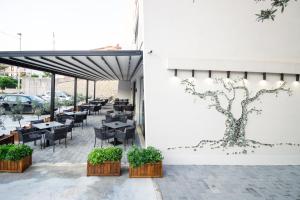 Ein Restaurant oder anderes Speiselokal in der Unterkunft Aparthotel & Spa KASMI 