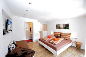 Posteľ alebo postele v izbe v ubytovaní Apartment Rossbichl