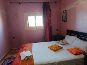 Tempat tidur dalam kamar di Kasbah Oualidia