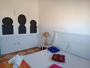 Tempat tidur dalam kamar di Kasbah Oualidia