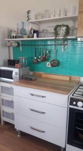 A kitchen or kitchenette at Nature View Boho apartment in Gumusluk Bodrum