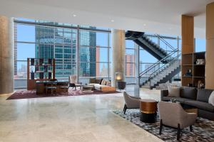 a living room with a view of a building at JW Marriott Dallas Arts District in Dallas