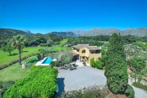 an aerial view of a house with a swimming pool at Villa Antonia in El Port