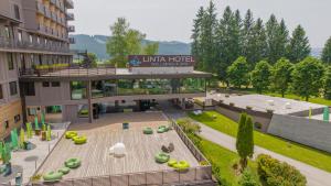 an overhead view of a building with a courtyard at Linta Hotel Wellness & Spa in Asiago