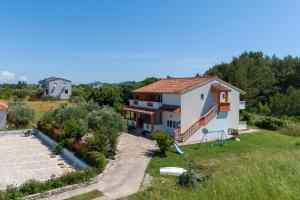 an aerial view of a house with a garden at Seaview Apartments in Pasman - Happy Rentals in Pašman