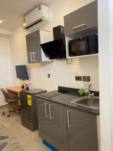 Kuchyň nebo kuchyňský kout v ubytování Mayama Residences