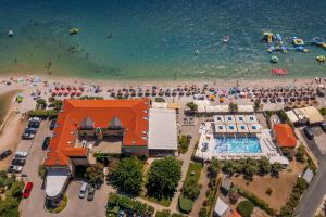 an aerial view of a beach with a crowd of people at Hotel Dobrovit in Baška