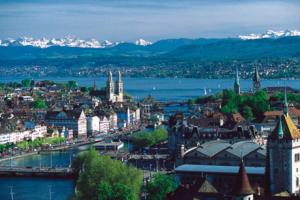 an aerial view of a city with a river and buildings at 2 room suite in the heart of Zurich with own washing in Zurich