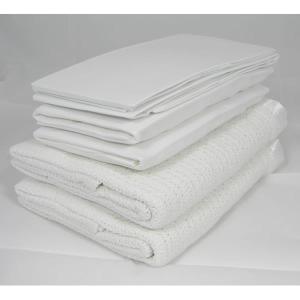 a pile of white towels sitting on top of each other at 2 room suite in the heart of Zurich with own washing in Zurich