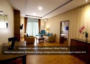TV a/nebo společenská místnost v ubytování Hotel Gren Alia Cikini