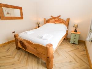 Un pat sau paturi într-o cameră la Forestside View