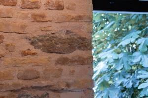 a brick wall with a heart on it at Homie Suites - One Bedroom Apartment in Galata in Istanbul