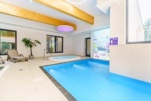 Swimmingpoolen hos eller tæt på Dominikana Apartament 41b + 4 billeder