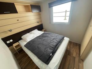 Postel nebo postele na pokoji v ubytování Camping Le Miroir