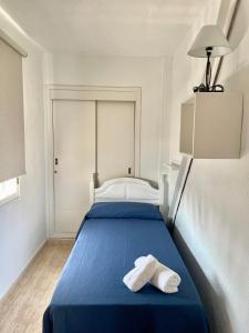 Łóżko lub łóżka w pokoju w obiekcie Apartamento turístico Playmon Bacana Planta 13