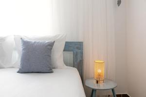 En eller flere senge i et værelse på Seagulls' House