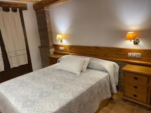 Postel nebo postele na pokoji v ubytování Alhanda Apartahotel