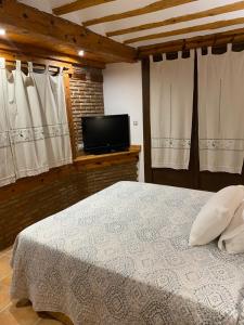 Postel nebo postele na pokoji v ubytování Alhanda Apartahotel
