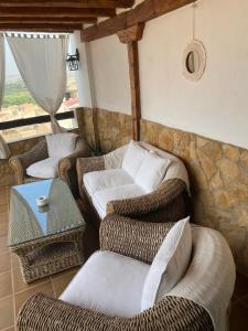 Posezení v ubytování Alhanda Apartahotel