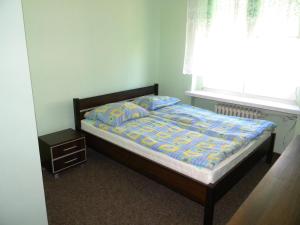 Postel nebo postele na pokoji v ubytování Pokoje Gościnne Saritas
