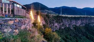 a building on the side of a mountain at Kayanberd Resort in Alaverdi