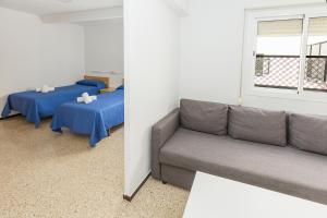 Posezení v ubytování Hostal El Mercat