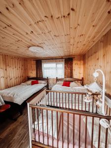 מיטה או מיטות בחדר ב-Käopesa Kodumajutus