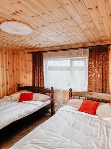 מיטה או מיטות בחדר ב-Käopesa Kodumajutus