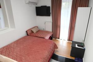 Voodi või voodid majutusasutuse Apartments Imper - IMD toas