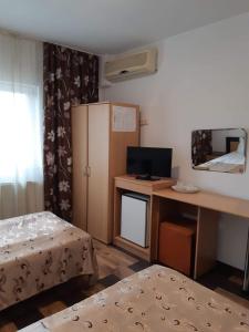 Postel nebo postele na pokoji v ubytování Hotel Mya