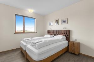 Postel nebo postele na pokoji v ubytování 4bed 4bath Sauna & Hot tub